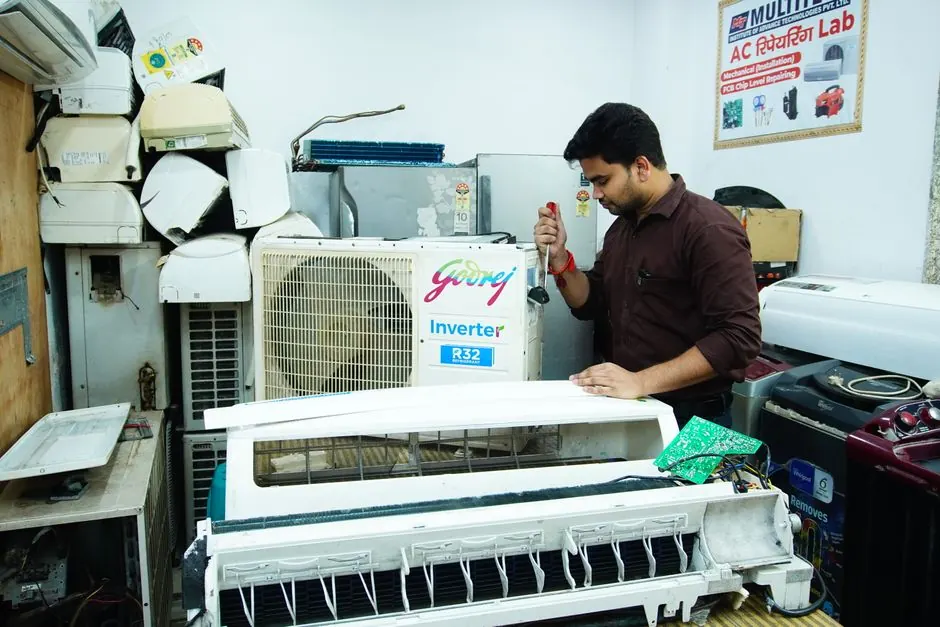 Technician using tools during a service visit